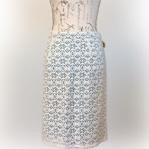 Chic White Lace Skirt with Green Underslip